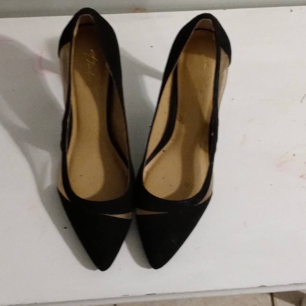 Black and mesh pumps